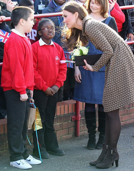 Let me tell you a secret... The Duchess of Cambridge revealed the name of her dog to students at Rose Hill Primary School during a visit to Oxford today