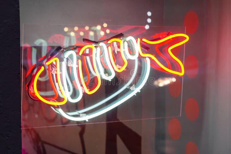 Neon sign fish. health seafood. luminous commercial window. Neon sign fish. health  seafood.  luminous commercial colorful window stock images